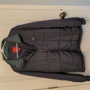 Izod , large puffer coat w / tuck hood.
